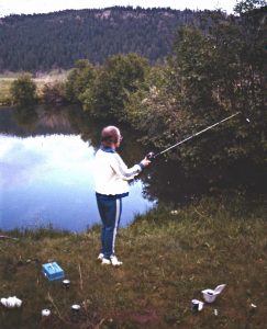 Elton John fishing at Caribou Ranch
