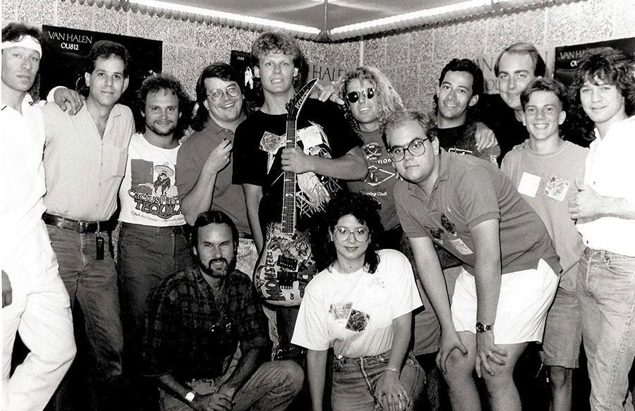 Van Halen with KAZY-FM staff and contest winners, backstage at the "Monsters of Rock" concert at Mile High Stadium, 1988 (Eddie Van Halen, far right; G. Brown, third from right)